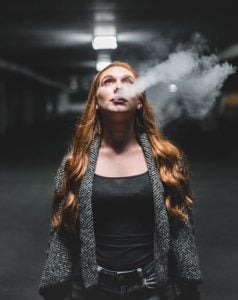 Girl Vaping CBD Oil